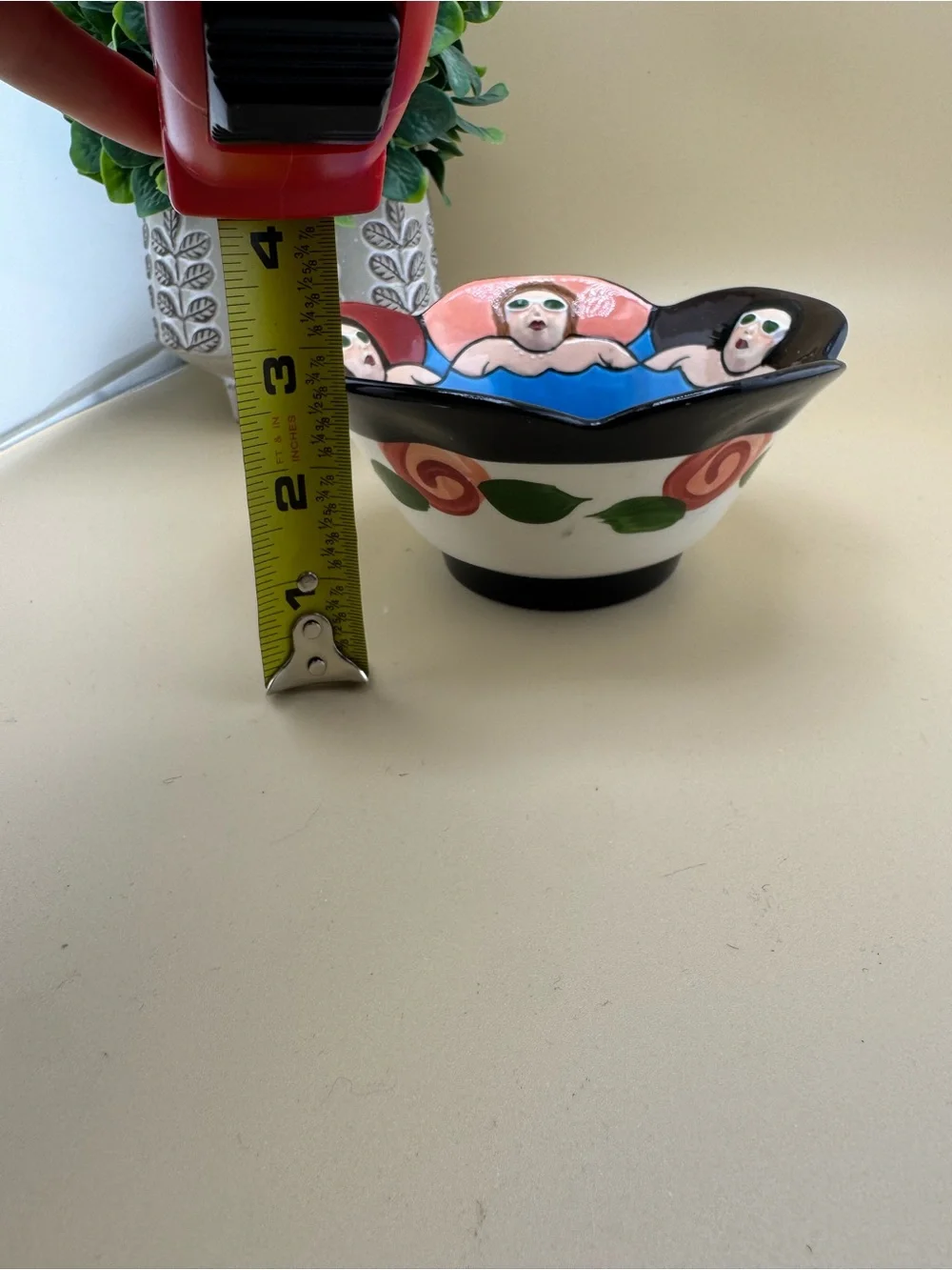 Hand-Painted Blue Ceramic Decorative Bowl with Figurative Border